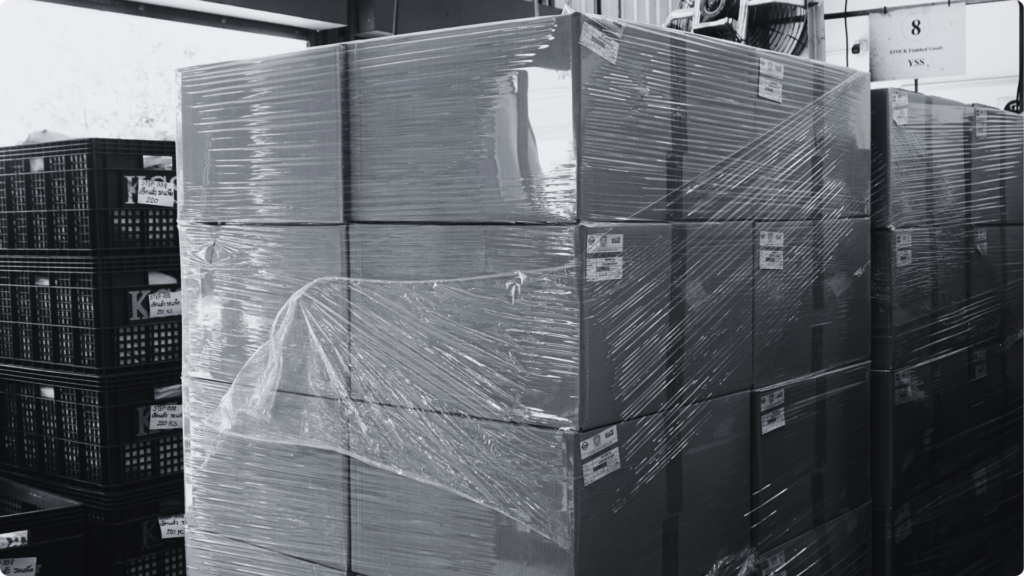Finished goods boxed, stretch-wrapped and palletised in the Packing step