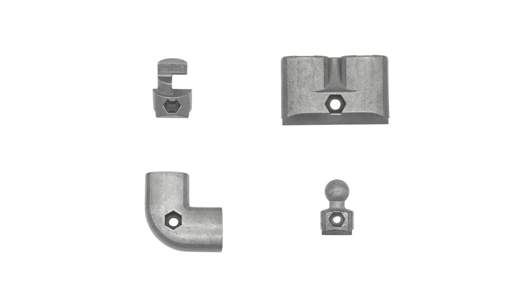 Four aluminium die cast profile connectors with hexagonal nut pockets, including a right-angle elbow