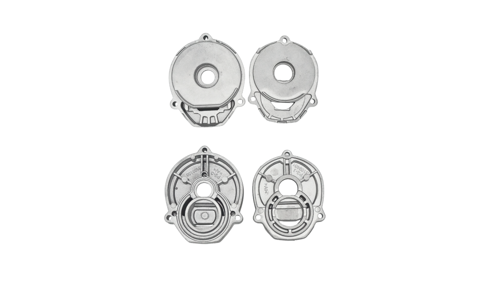 Die cast aluminium power tool gearbox housings shown front and back with cast part numbers