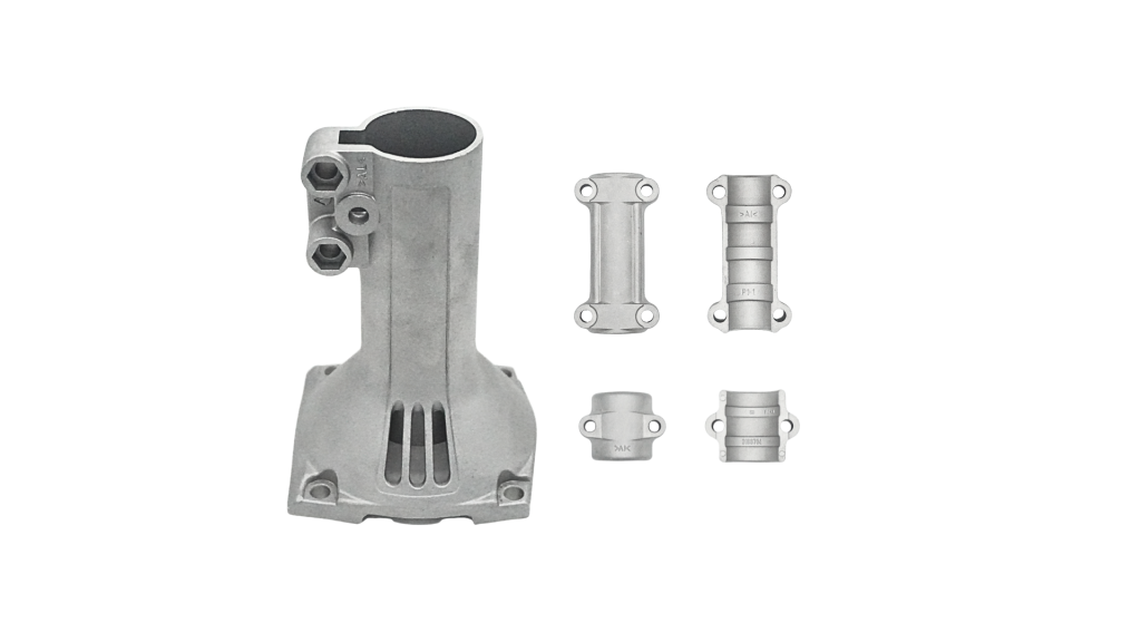 Die cast aluminium angle grinder gear head with tube socket, beside four pipe clamp halves