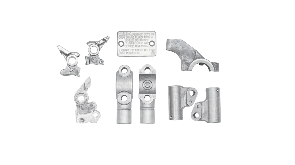 Machined aluminium brake arms, handlebar clamps and a reservoir cap plate for motorcycles