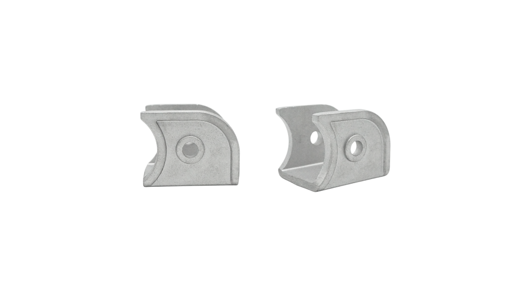 Pair of die cast aluminium scaffold saddle clamps with curved tube seats and bolt holes